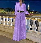Elegant long-sleeved blouse with V-neckline and wide sequinned jumpsuit trousers