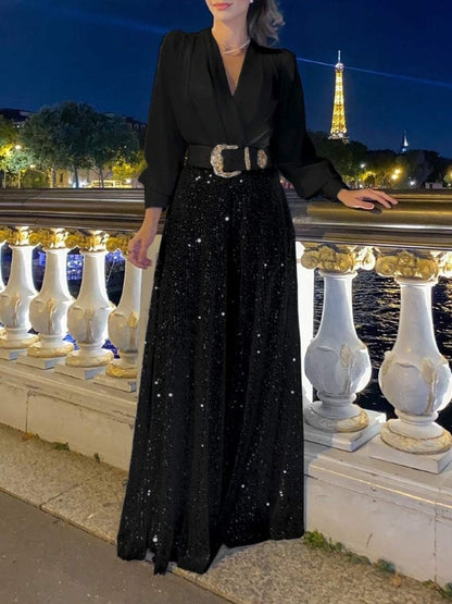 Elegant long-sleeved blouse with V-neckline and wide sequinned jumpsuit trousers