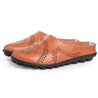 Loose-fitting slippers with a floral cutout, suitable for all foot types